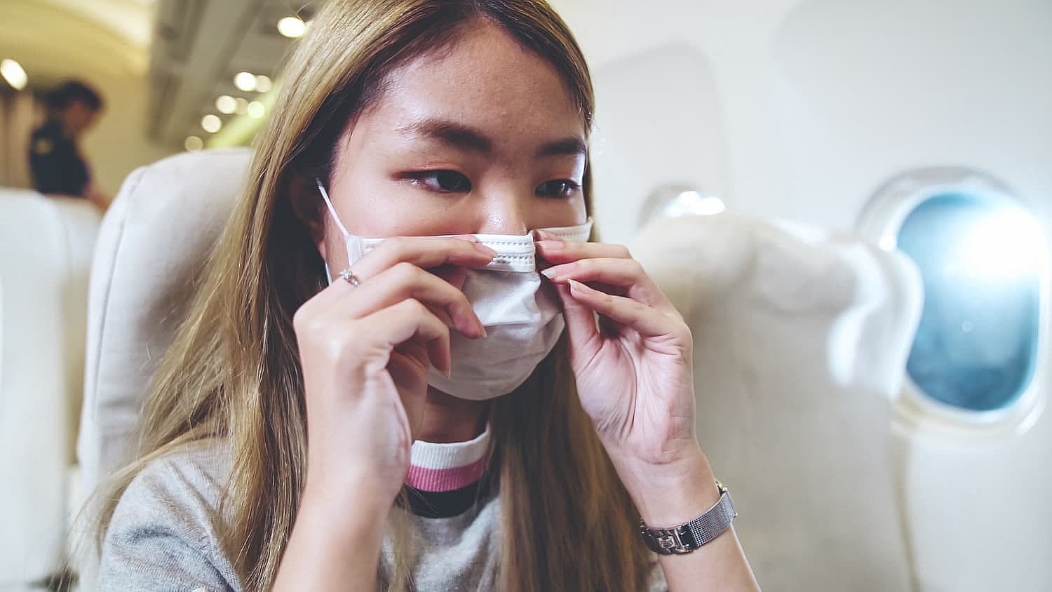 A woman wearing a face mask mouth breathing in Prosper or Colleyville, TX
