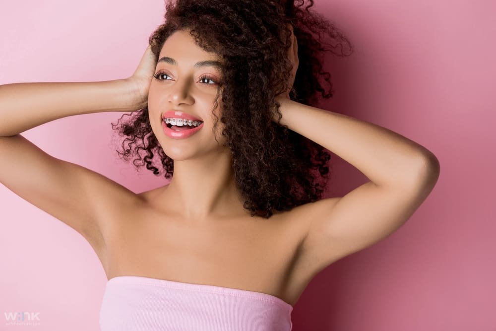 beautiful girl metal braces pink - How to Get Braces Glue Off Teeth in Prosper and Colleyville, TX